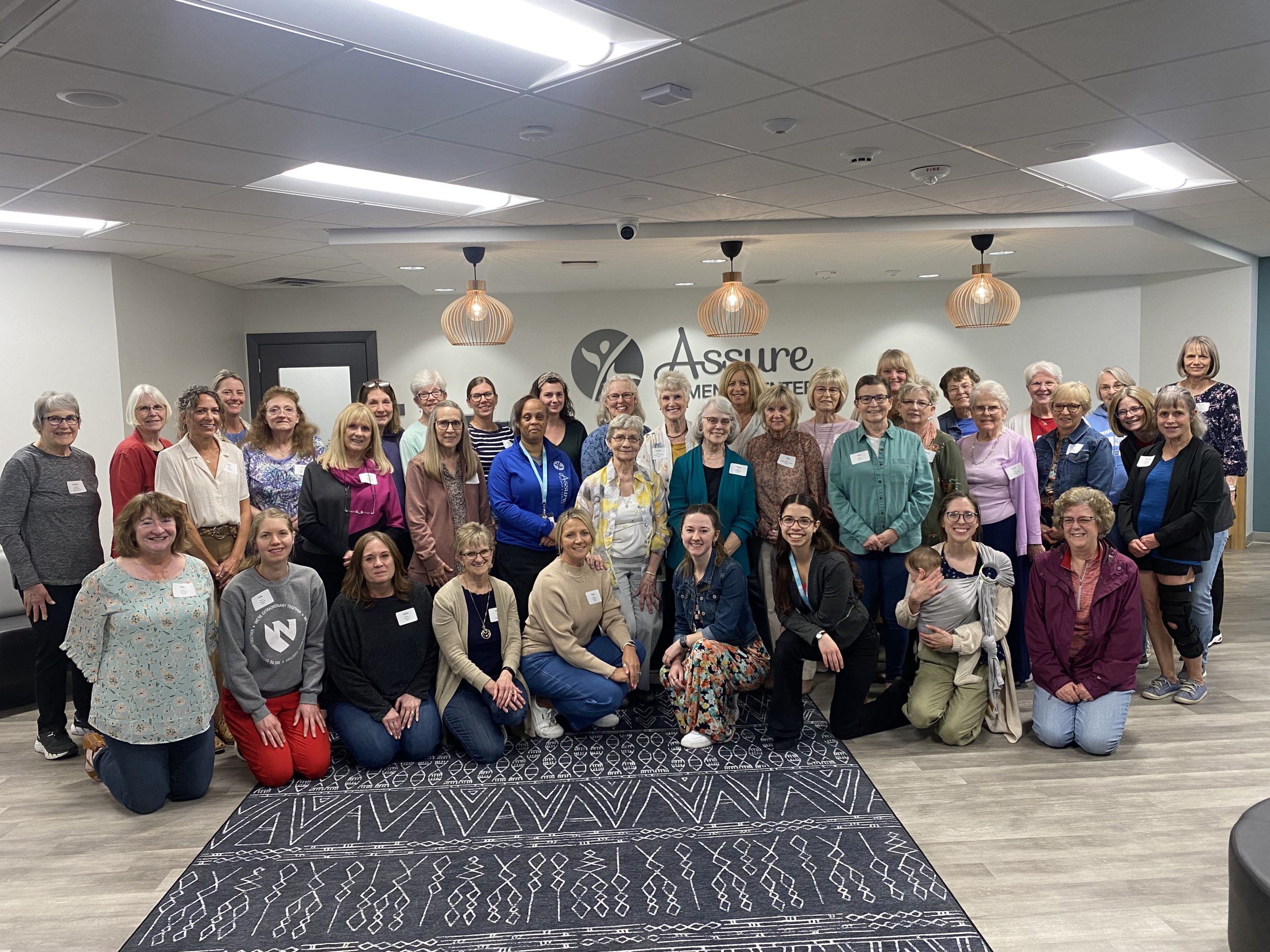 https://firststeptolife.com/wp-content/uploads/2025/03/Assure-Volunteers.jpg